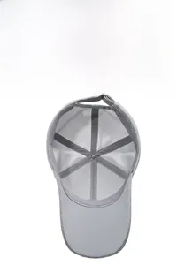 Detailed inner view of light grey mesh baseball cap showing breathable structure and strap