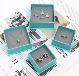 Top view of Tiffany blue jewelry boxes with gray velvet lining for necklaces and rings