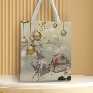 Detail of Christmas canvas tote bag featuring Santa Claus and reindeer print on wooden stand