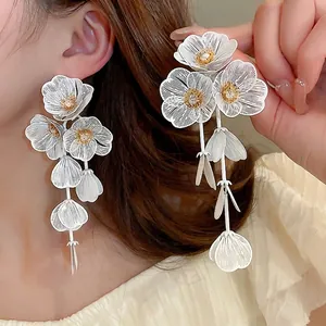 Elegant white tassel flower earrings with zircon petals for weddings and vacations
