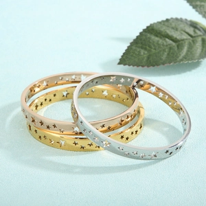 Three-piece hollow star cutout bangles in gold, rose gold and silver stainless steel