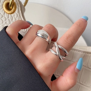 Minimalist silver water drop rings with smooth crossed lines and wide band design