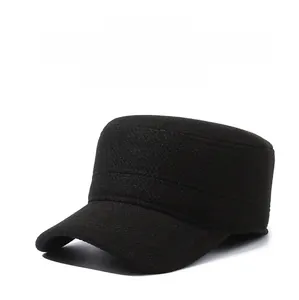 Detail view of winter men's wool flat cap with fleece lining and metal sports logo