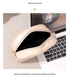 Internal capacity of the beige faux leather crossbody bag showing inner lining space