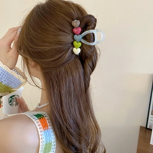 Translucent grey heart hair claw clip with colorful mini hearts for women hairstyles