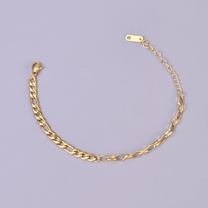 Detail showing the K18 hallmark stamp on a gold-plated stainless steel chain link