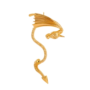Gothic gold dragon ear cuff with detailed wings and scales on a white background