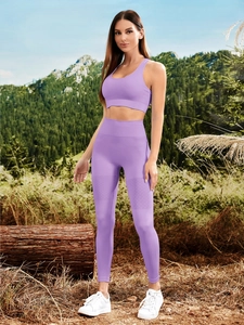 Close-up of purple yoga set featuring diamond pattern knit details and breathable mesh holes