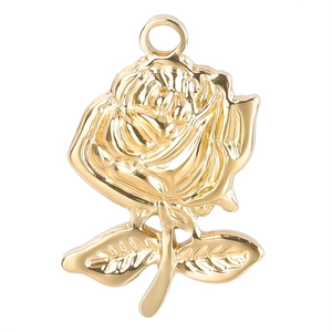 Detail of a 3D gold rose flower pendant with polished metal leaves and hanging loop