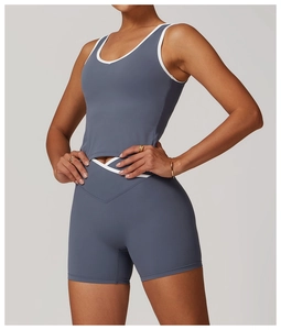Detail of high-stretch sports set featuring contrast trim and V-shaped crossover waistband