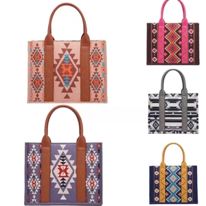 Detail showing five different ethnic geometric patterns and color variants of the tote bag
