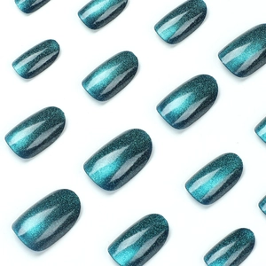 Cat eye blue press-on nails with magnetic shimmer and oval shape in various sizes