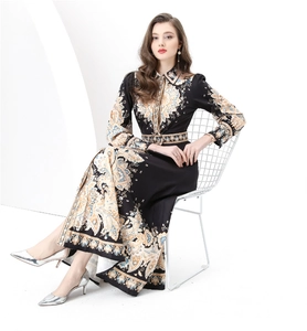 Detail of vintage paisley print on 2025 long sleeve maxi dress with elegant waist belt