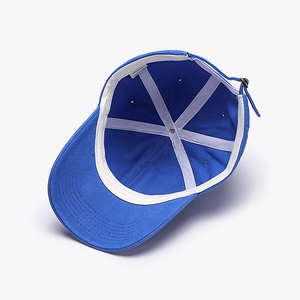 Navy blue cotton baseball cap showing internal structure and adjustable metal buckle strap