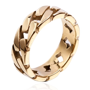 Detailed close-up of golden Cuban link ring with a high-polished metallic finish