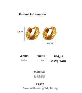 Detail showing dimensions of matte gold twisted hoop earrings, 1.3cm height and 1.4cm width