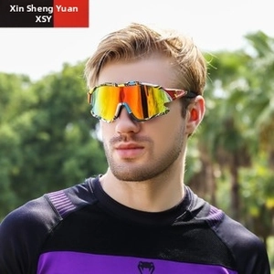 Close-up of polarized cycling sunglasses with graffiti frame on athlete in outdoor setting