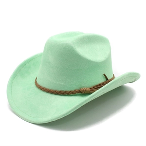 Detail of light green suede jazz hat with brown woven tassel band on white background