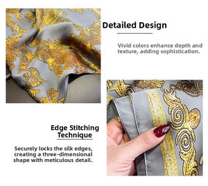 Close-up of golden baroque patterns on grey faux silk scarf with fine stitching detail