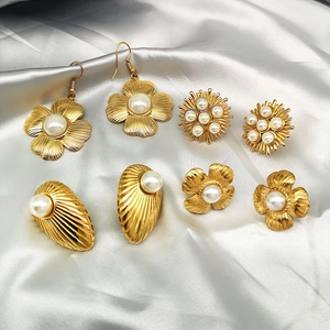 Vintage 18K gold plated twisted pearl earrings in floral and sunflower designs