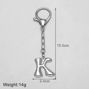 Detailed view of silver bubble letter K keychain with lobster clasp and dimension labels