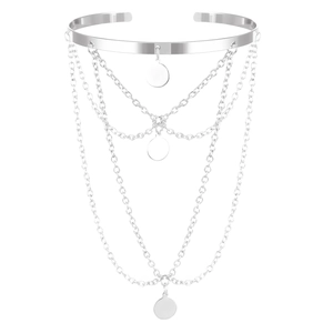 Detail of silver layered chain arm cuff featuring polished round pendants and open design