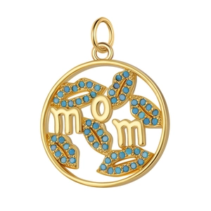 Macro detail of golden circular pendant with mom lettering and blue enamel inlay