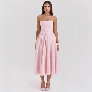 Detail of pink strapless midi dress with ruched fabric and slim fit waist design
