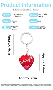 Detailed view of red heart PVC keychain with LOVE text and size measurement markings