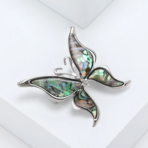 Elegant butterfly brooch with natural abalone shell and rhinestones on geometric blocks