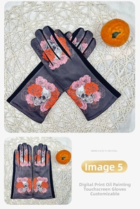 Detail view of warm suede PU touch screen gloves featuring 3D skull and floral oil painting