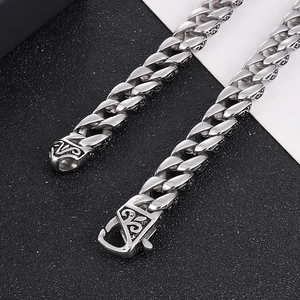 Vintage 316L stainless steel Cuban link necklace with intricate floral side engravings