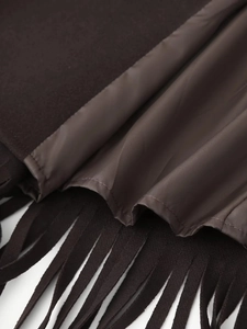 Close-up of deep brown wool jacket featuring fringe details and premium satin lining