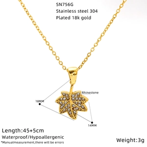 Detail showing 18k gold plated leaf pendant with zircon inlay and product dimensions