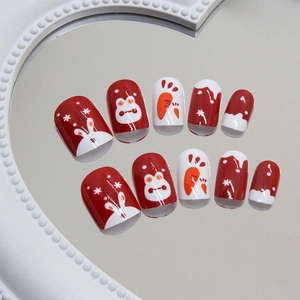 Short round burgundy press-on nails with rabbit and snowflake patterns for New Year