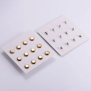 Set of 6 pairs minimalist round gold shell earrings on display card front and back view