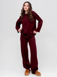 Two-piece distressed knit set with round neck top and wide-leg trousers in dark burgundy