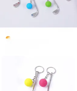 Close-up of mini golf club keychain details with colorful balls and metal keyring