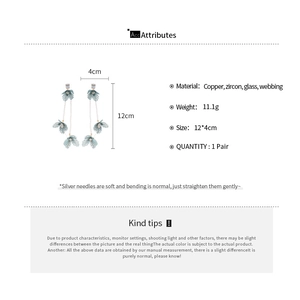 Detail specifications for long blue fabric flower tassel earrings with zircon accents