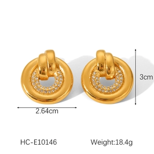 Detailed view of gold plated earrings with crystal pavé and size dimensions in cm