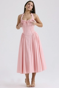 Detail of pink halter neck dress featuring a fitted waist and pleated mid-length skirt