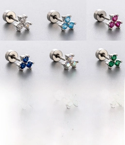 Detail of six sets of flower-shaped titanium steel studs with colorful zircon stones