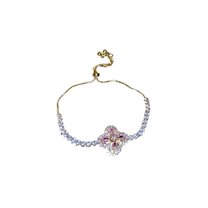Bracelet fleur doré chic avec cristaux roses et fermoir coulissant réglable bolo