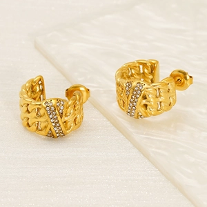 Detail of 18k gold plated chain link earrings with sparkling crystal accents