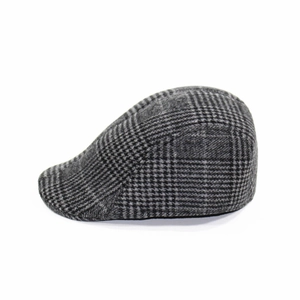 Vue latérale d'une casquette plate en laine à motif pied-de-poule gris et noir épais