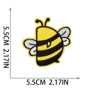 Macro detail of bee embroidery patch showing fine stitching and 5.5cm size scale