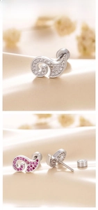 Detailed close-up of double-headed cloud stud earrings with white and pink zircon stones