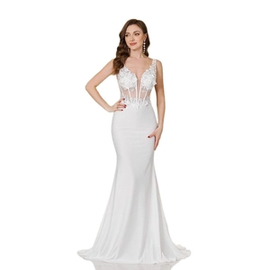 Elegant white V-neck mermaid wedding dress with lace floral appliques and sheer details
