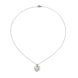 Close-up of silver heart pendant with sparkling central stone and cubic zirconia details
