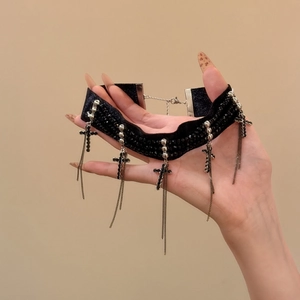 Black velvet choker necklace with sparkling rhinestones and cross fringe tassels